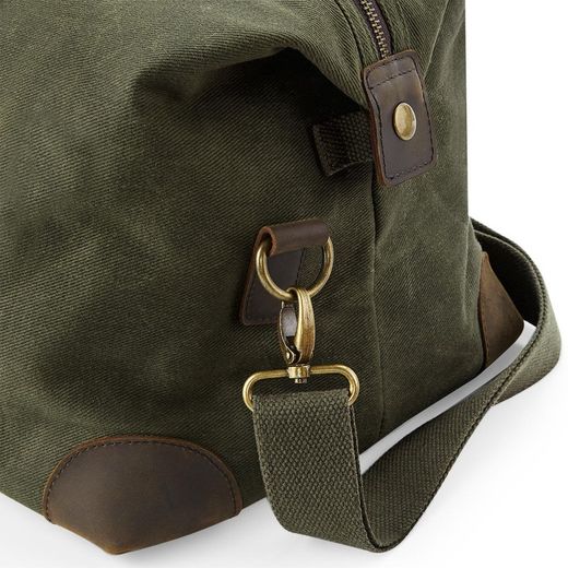Bolsa de Viaje Heritage en Lona Encerada – 19 L, Cremallera y Bolsillo Frontal – Estilo Clásico Cuero y Latón