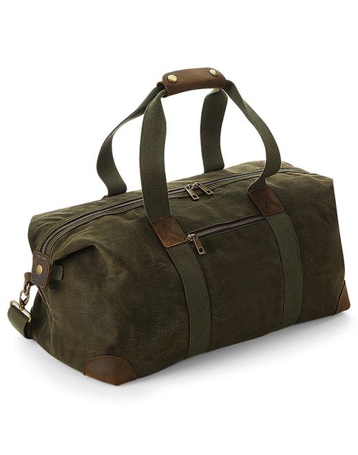 Bolsa de Viaje Heritage en Lona Encerada – 19 L, Cremallera y Bolsillo Frontal – Estilo Clásico Cuero y Latón