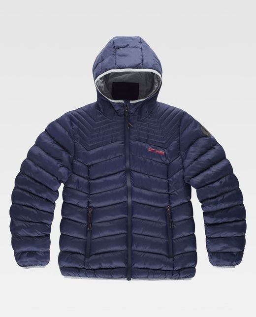 Veste matelassée pour femme RËFAR avec un motif de surpiqûres qui rehausse l'image de l'empiècement caractéristique de la marque.  marin