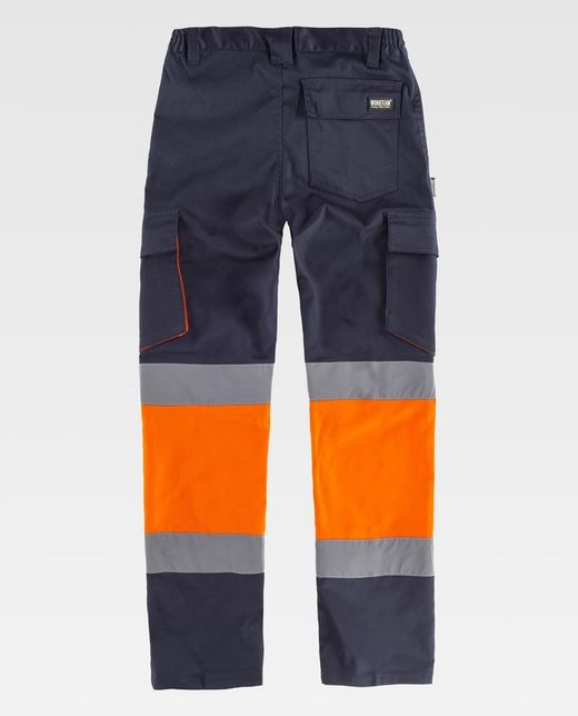 Pantalón combinado con alta visibilidad y cintas reflectantes de corte estilizado, diseño 'Slim Fit' Color Marino+Naranja A.V.