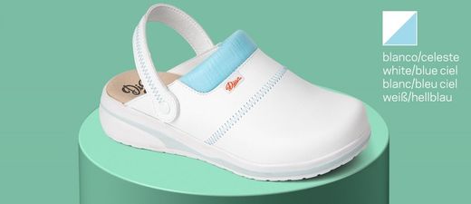 Zoccolo con cinturino di supporto del tallone pieghevole, realizzato in microfibra tecnica traspirante con imbottitura sul collo del piede per evitare irritazioni. Colore bianco / azzurro