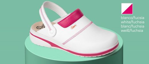 Clog mit klappbarem Fersenstützgurt aus atmungsaktiver technischer Mikrofaser mit Polsterung am Spann, um Reibung zu vermeiden. Farbe Weiß / Fuchsia